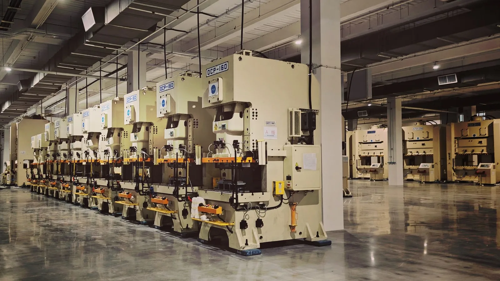 Hydraulic press-brake line forming sheet-metal panels at the Gulfstone plant in Shunde, Foshan, Guangdong