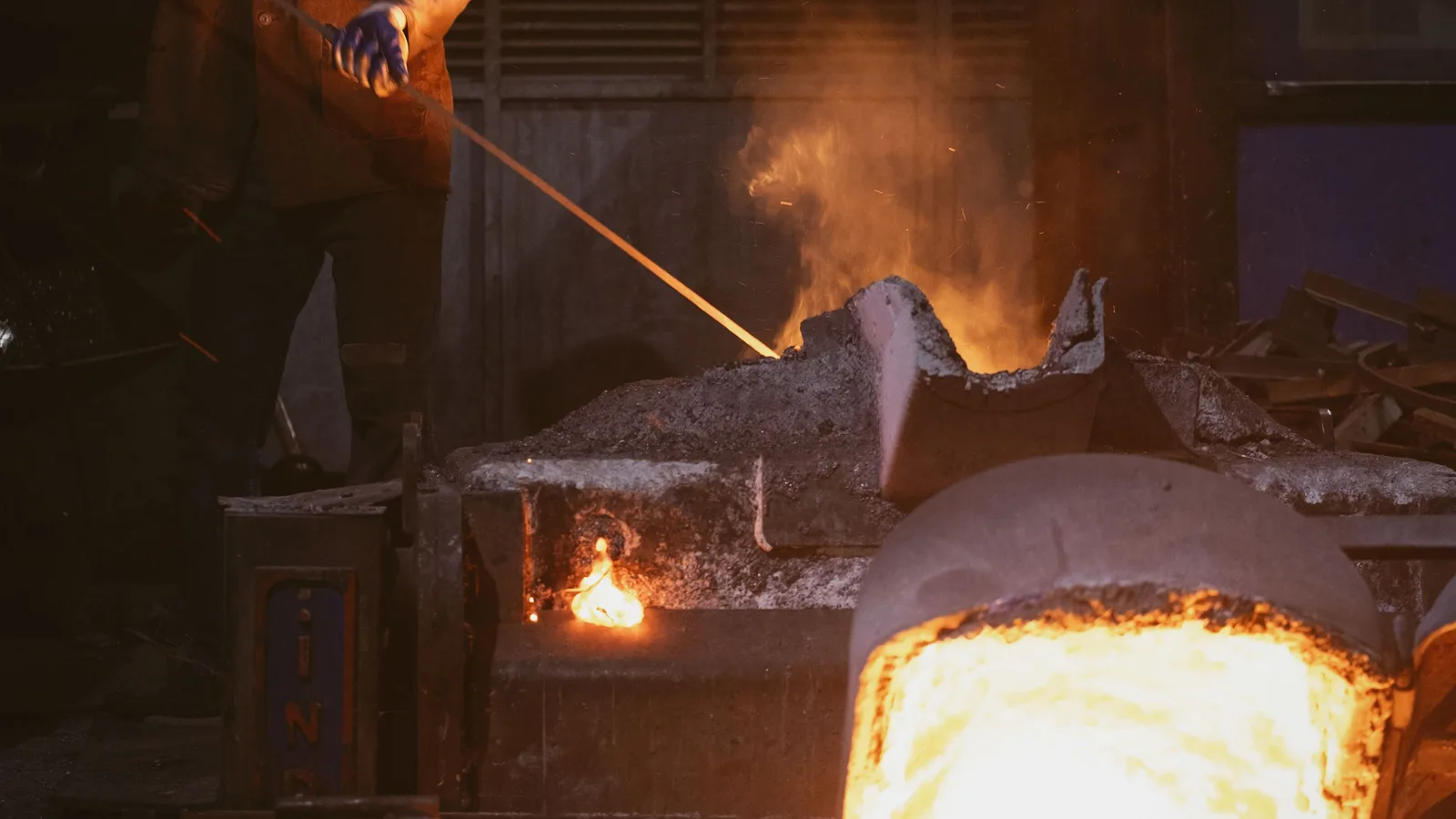 Molten metal being poured at a foundry, the castings stage of the partner network